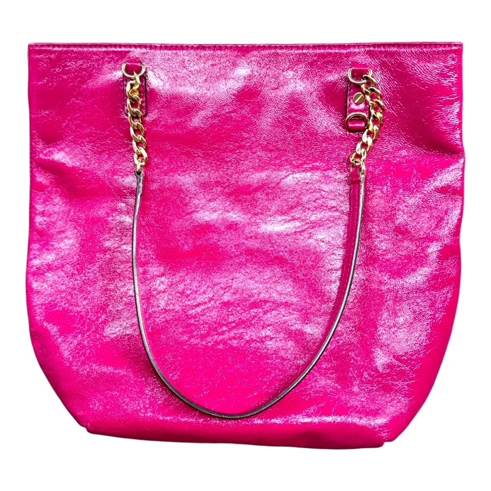 Michael Kors patent leather handbag in a sleek, glossy finish.
